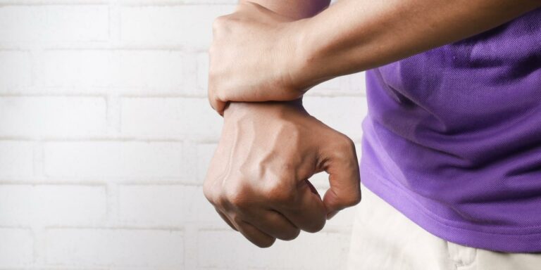 A person suffering from gout in their wrist